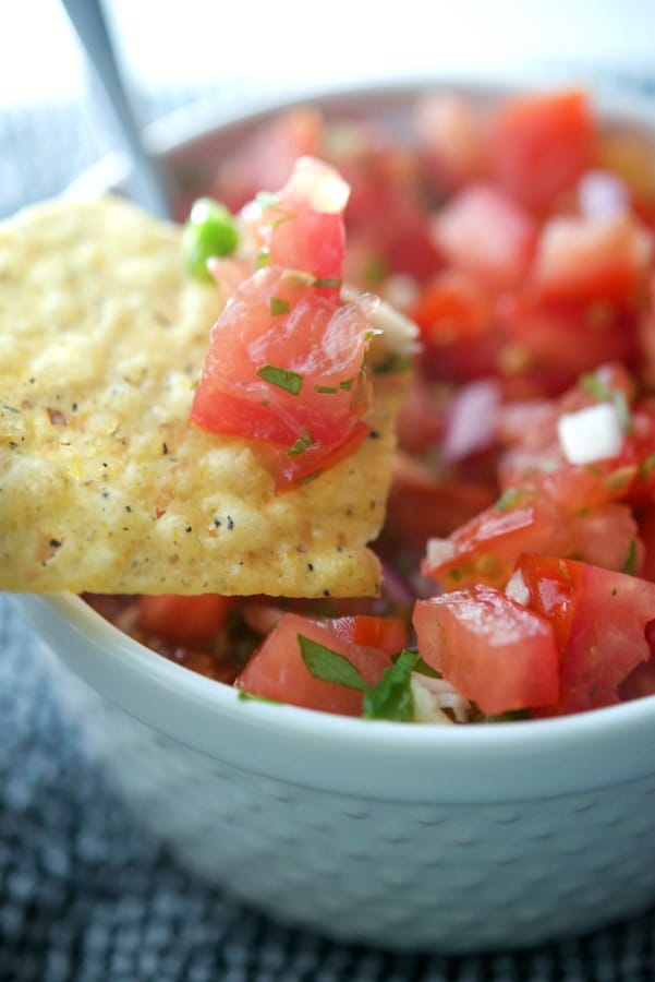 Pico de Gallo; a cold Mexican dip made with fresh tomatoes, onions, cilantro, jalepeno peppers and lime juice is deliciously refreshing.