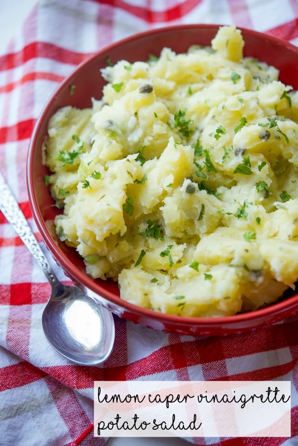 Lemon Caper Vinaigrette Potato Salad in red bowl