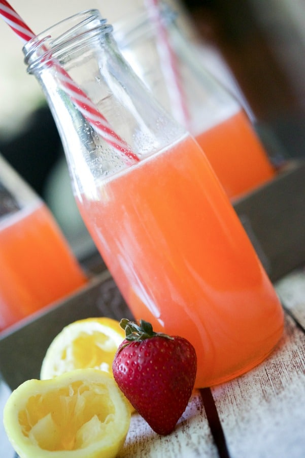 A close up of a glass of Strawberry Lemonade