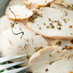Sliced turkey breast on a plate