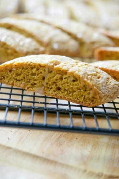 Pumpkin Spice Biscotti in rows on a cooling rack.