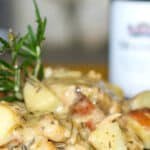 Braised Chicken and Red Potatoes in a White Wine Rosemary Sauce made with chicken thighs is a delicious one pot meal.