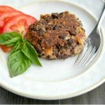 Caprese Black Bean Burgers on a white plate. 