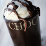 Nutella Hot Chocolate in a brown mug with whipped cream