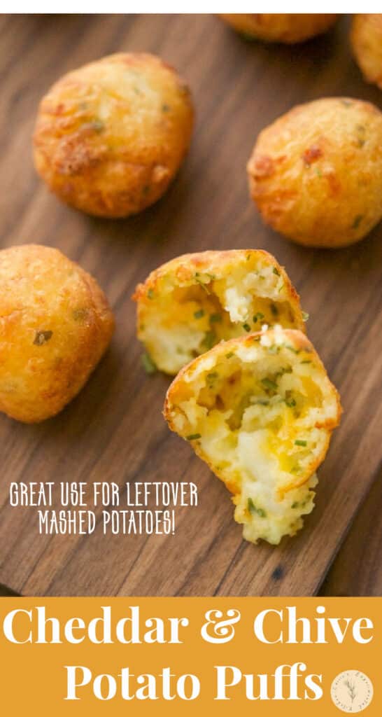 Cheddar Chive Potato Puffs on a wooden cutting board. 