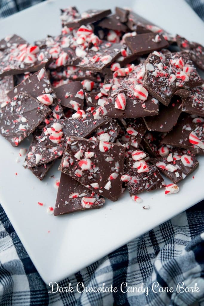 Candy Cane Bark made with Ghirardelli dark chocolate, peppermint extract and crushed candy canes makes a tasty holiday treat. 