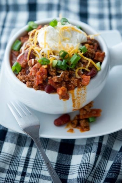 Hearty Chorizo Chili made with lean ground beef, Portuguese chorizo, kidney beans, fire roasted tomatoes and seasonings is comfort food at its best.