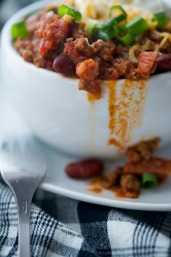 Hearty Chorizo Chili made with lean ground beef, Portuguese chorizo, kidney beans, fire roasted tomatoes and seasonings is comfort food at its best.