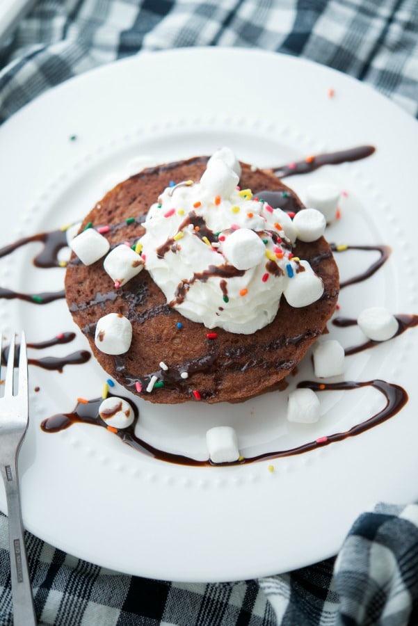 Hot Chocolate Pancakes on a plate with a fork 