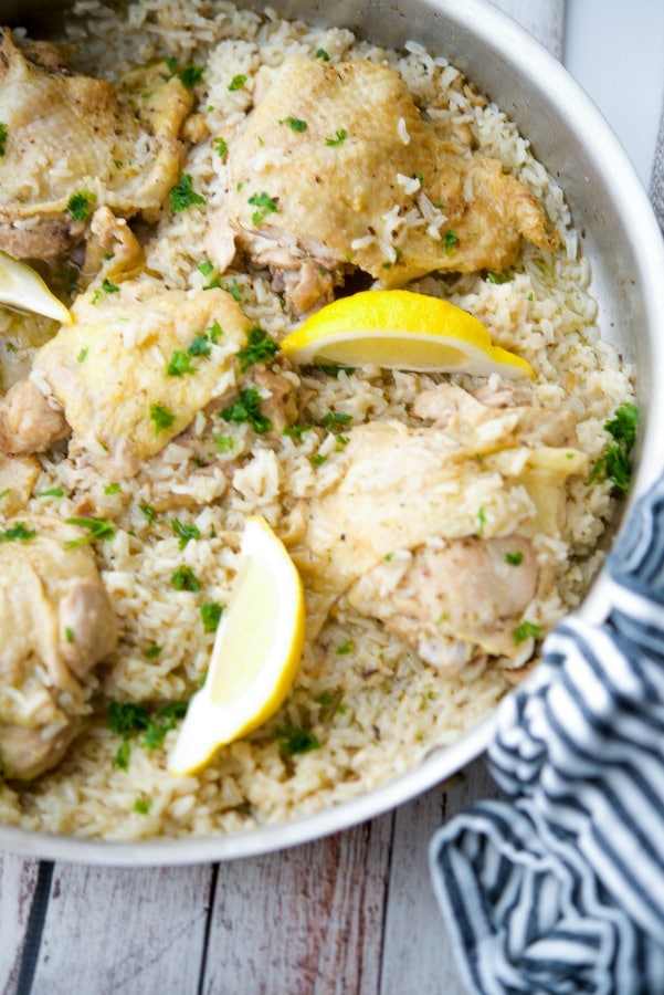 Greek Chicken & Rice made in your skillet on top of the stove is simple to make and loaded with the classic oregano and lemon flavors you love. 
