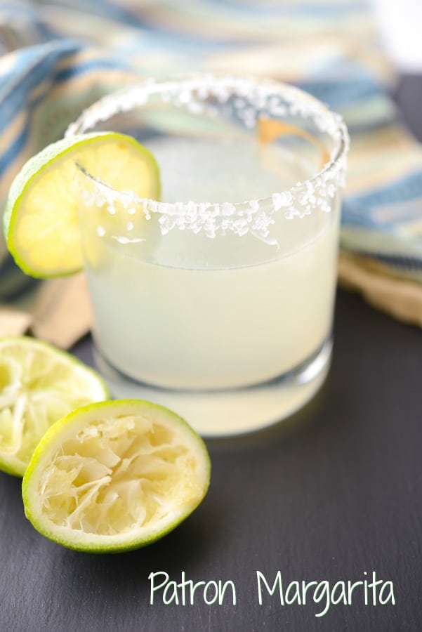 Patron Margarita on a table with lime 