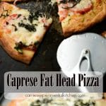 A close up of Caprese Fat Head Pizza with pizza cutter