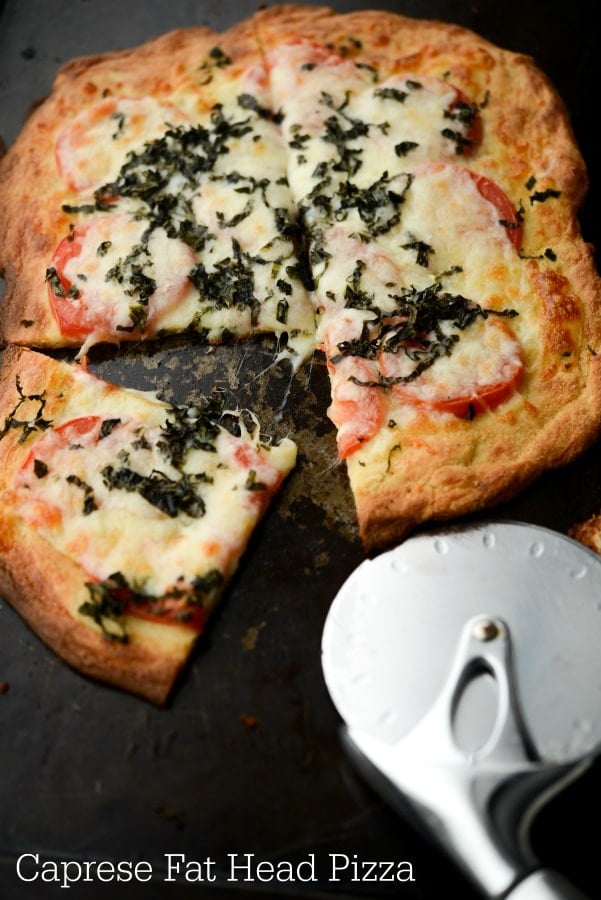 Caprese Fat Head Pizza made with Mozzarella, cream cheese and almond flour is a low carb way to make one of your favorite recipes. 