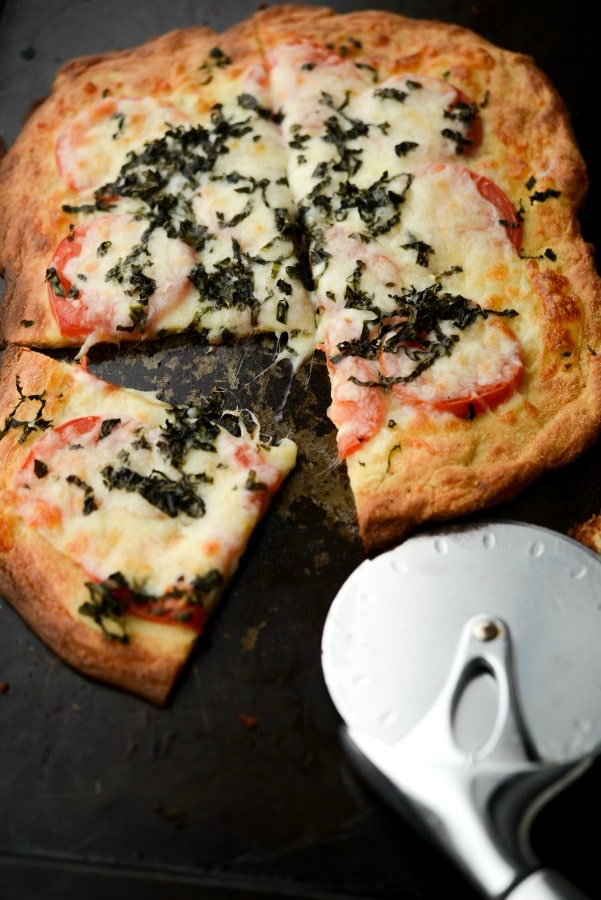 A slice of Caprese Fat Head Pizza