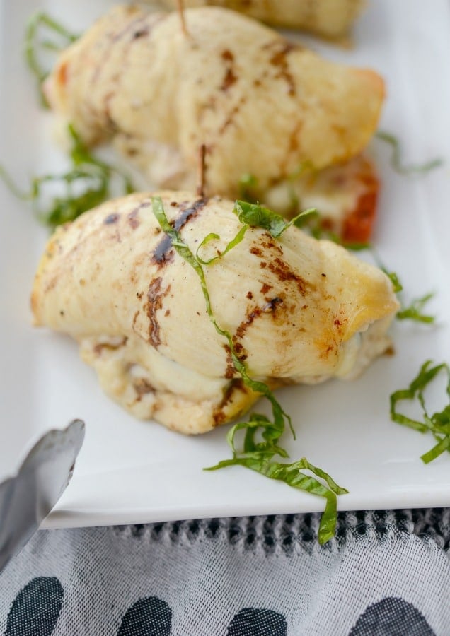 A plate of Caprese Stuffed Chicken on a table