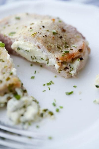 Cream Cheese and Chive Stuffed Pork Chops are a simple to make, quick weeknight meal that is gluten free, low carb and Keto Diet friendly. 