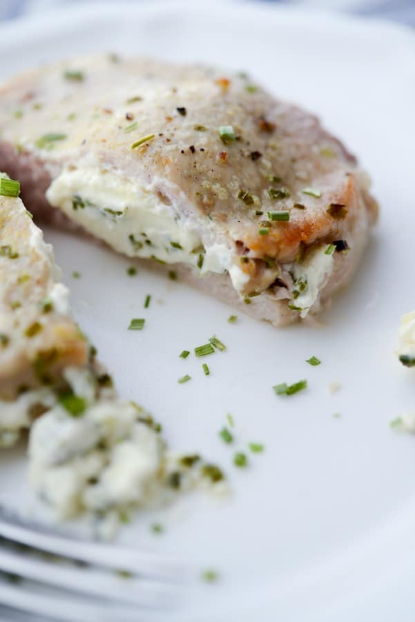 Cream Cheese and Chive Stuffed Pork Chops are a simple to make, quick weeknight meal that are gluten free, low carb and Keto Diet friendly.