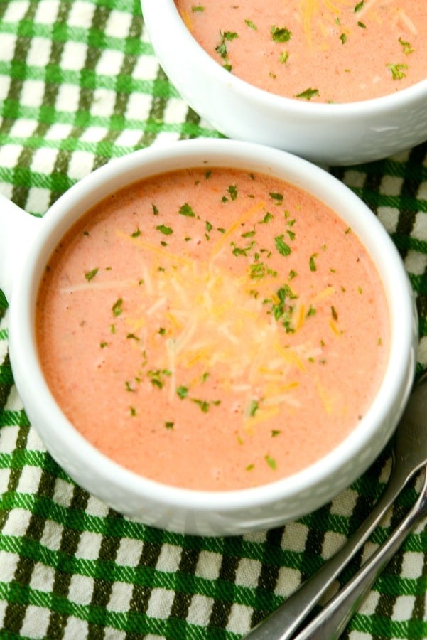 A bowl of Creamy Fire Roasted Tomato cheddar soup