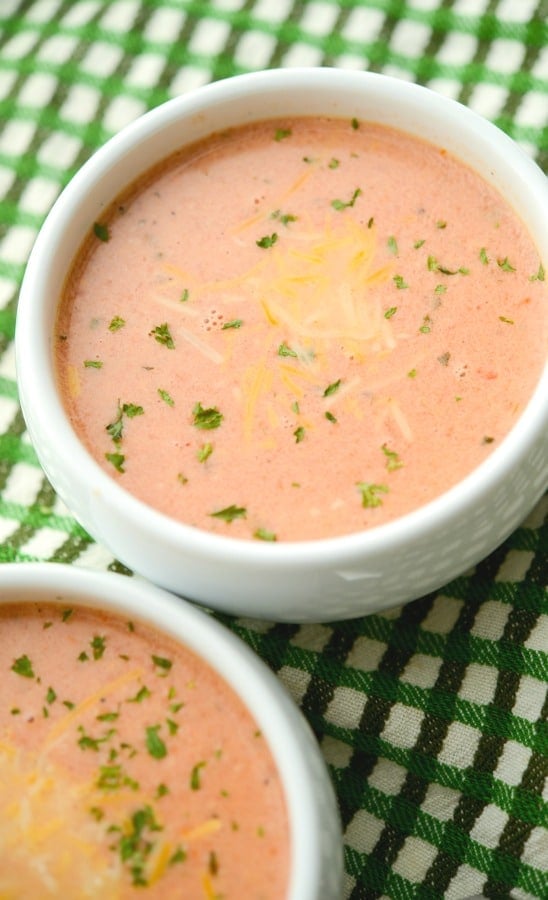 A close up of Creamy Fire Roasted Tomato Cheddar Soup