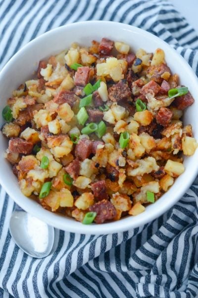 A bowl of Portuguese Chorizo and potatoes on a table