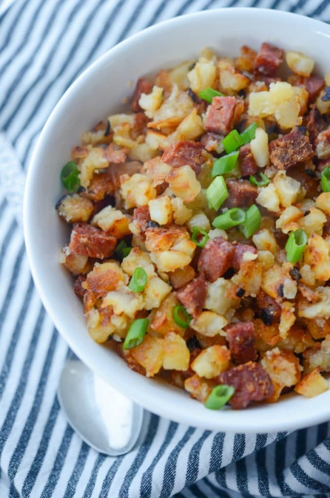 Portuguese chorizo and diced russet potatoes are simple to make and one of our family's favorite, Sunday morning breakfast side dishes.