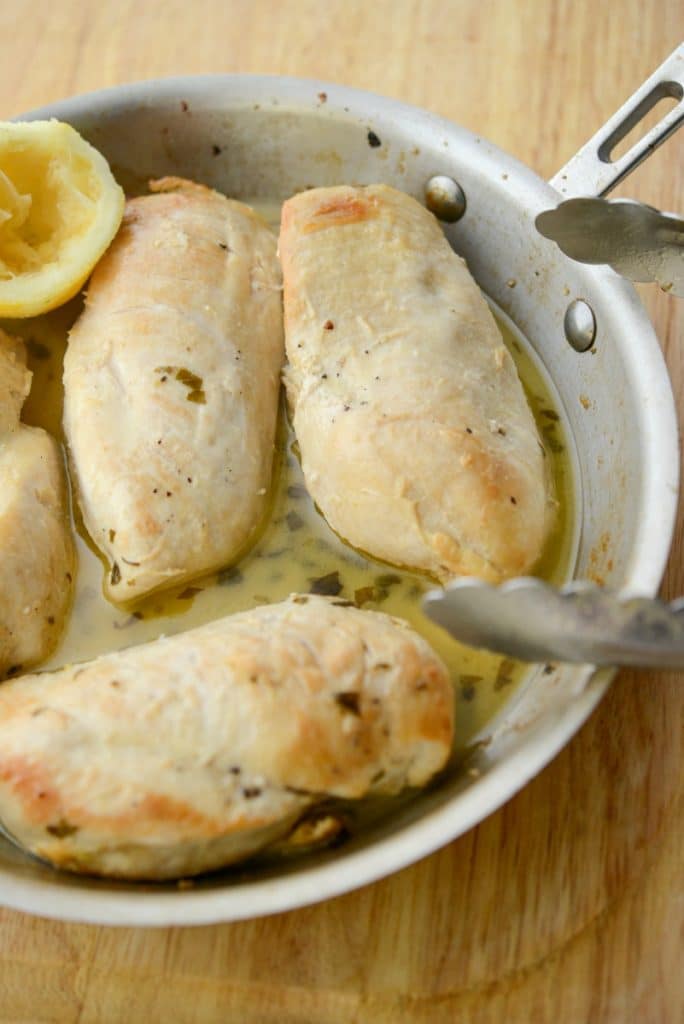 Deliciously quick and easy, this Skillet Lemon Chicken made with boneless chicken breasts will be your your new favorite weeknight go to meal.