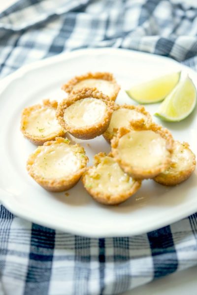 Key Lime Pie Tassies made with fresh key limes in a graham cracker crust.