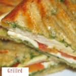 Grilled Chicken Panini with pesto, Mozzarella cheese and fresh tomato on Italian Panella bread.