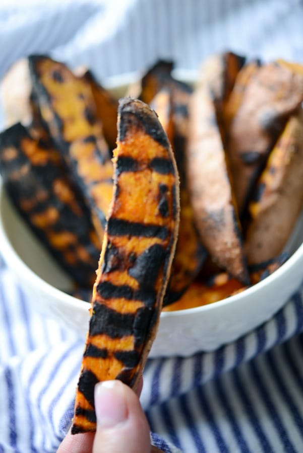Grilled Sweet Potato Wedges made with three ingredients are quick and easy to make, they'll be your new favorite side dish.