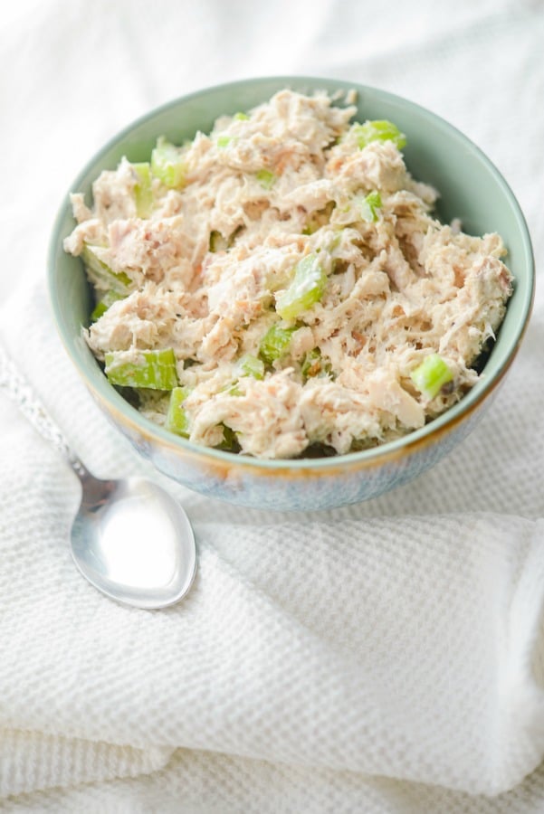 A bowl of Rotisserie Chicken Salad with a spoon