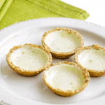 a plate of key lime tassies