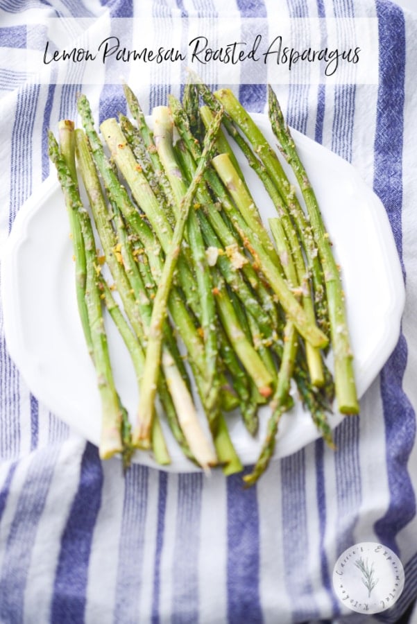 Fresh bundles of asparagus tossed with lemon zest, grated Parmesan cheese, Extra Virgin Olive Oil; then briefly roasted in the oven until al dente.