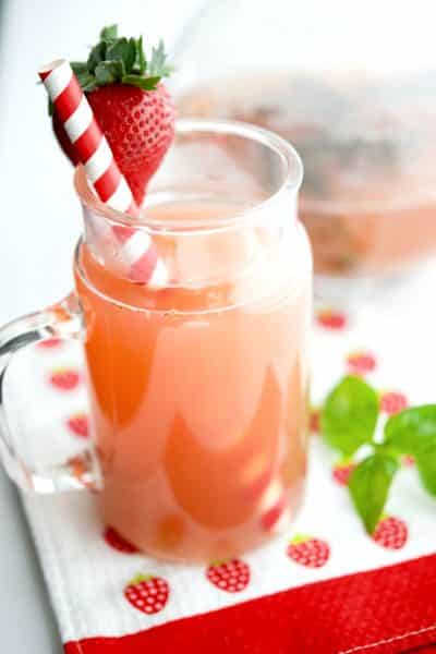 A close up of Strawberry Basil green tea in a glass