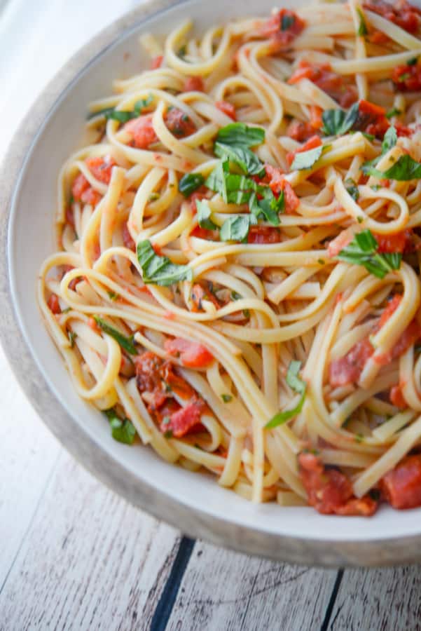 Enjoy the popular Linguine Positano made with fire roasted tomatoes, garlic and basil from Carrabba's Italian Grill at home.