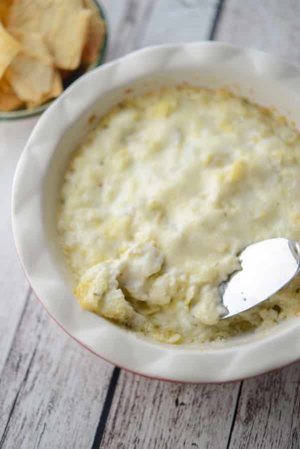 Marinated artichoke hearts combined with grated Pecorino Romano cheese, garlic and mayonnaise; then baked until hot and bubbly makes a tasty dip. 