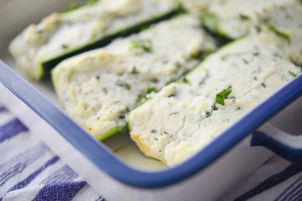 Ricotta, Goat Cheese and Basil Stuffed Zucchini in baking dish