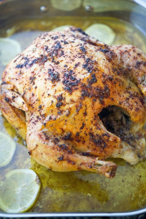 Lemon Pepper Whole Roasted Chicken in a pan