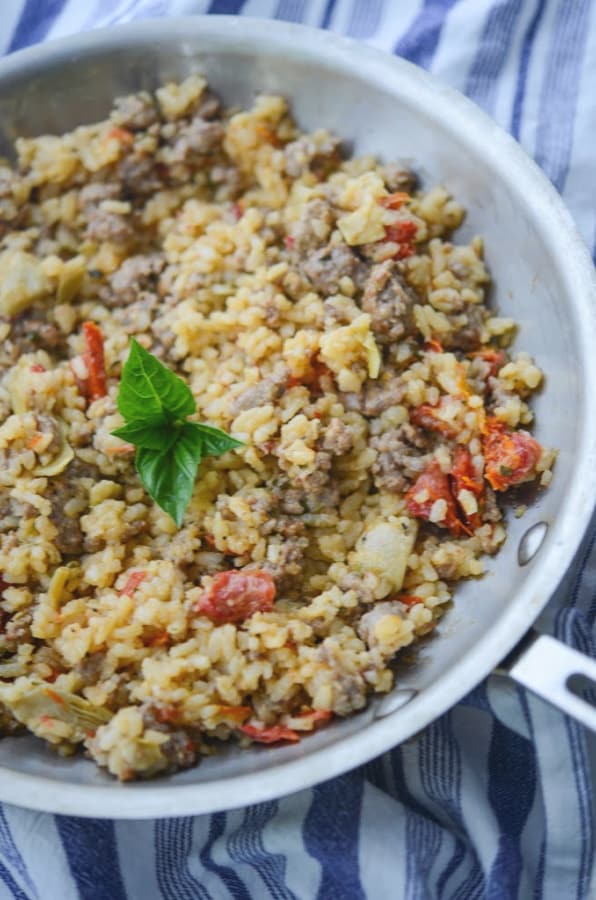 Sausage, Artichoke and Sun Dried Tomato Risotto in a pan