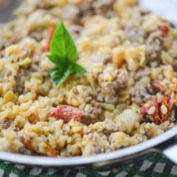 Sausage, Artichoke Hearts and Sun Dried Tomato Risotto in pan