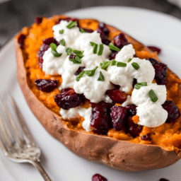 a close up of cranberry goat cheese sweet potatoes