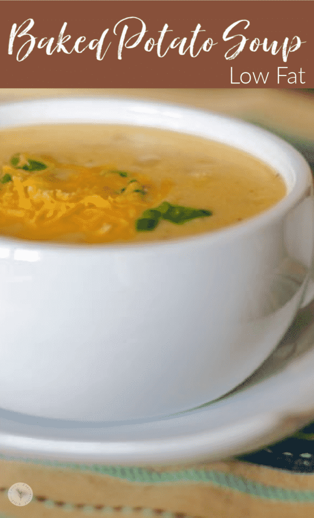 Low Fat Baked Potato Soup in a white crock