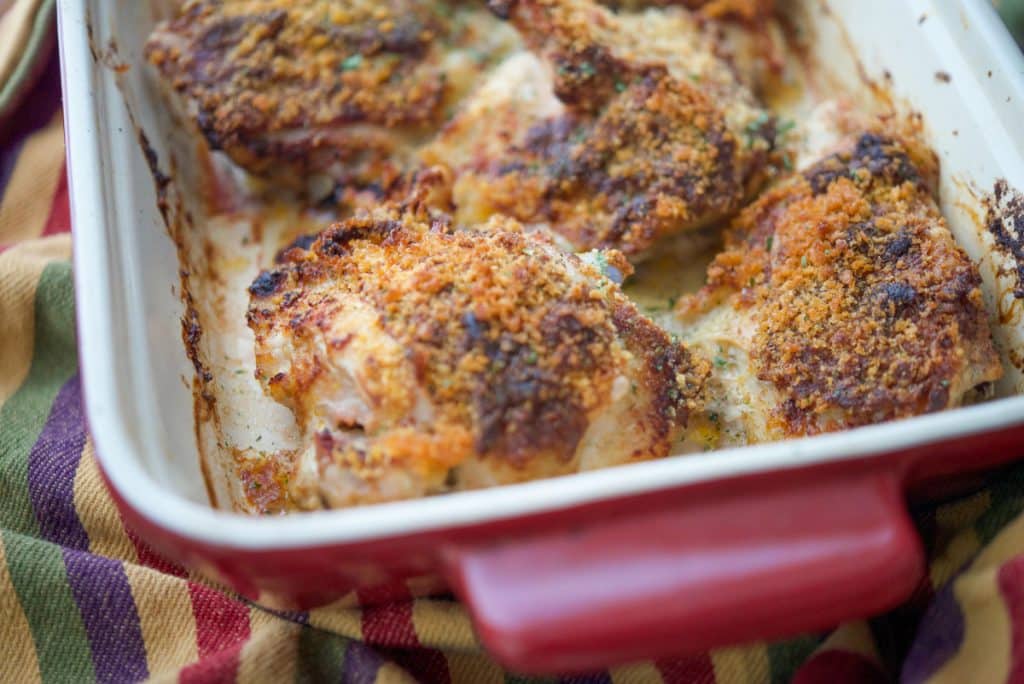 Baked Deviled Chicken Thighs in casserole dish