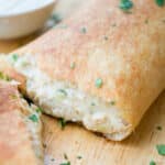 Buffalo Chicken Stromboli made with pizza dough, chicken, hot sauce, Bleu and Mozzarella cheeses makes the perfect snack!