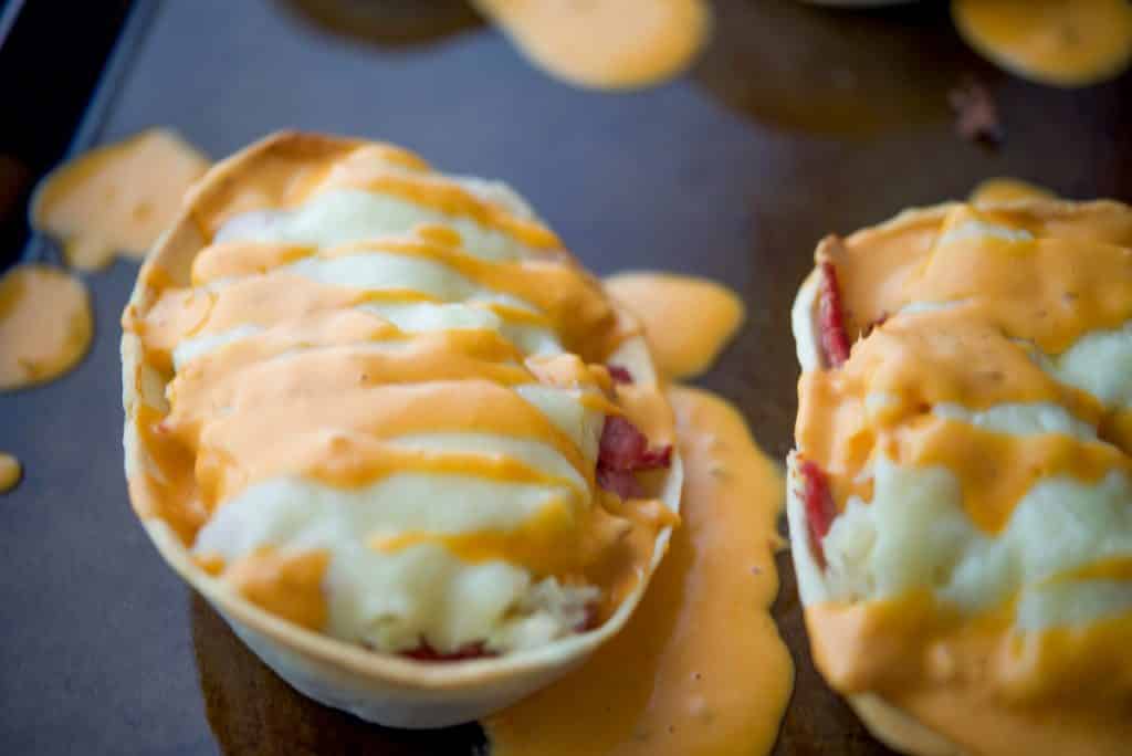 A close up of Reuben tacos