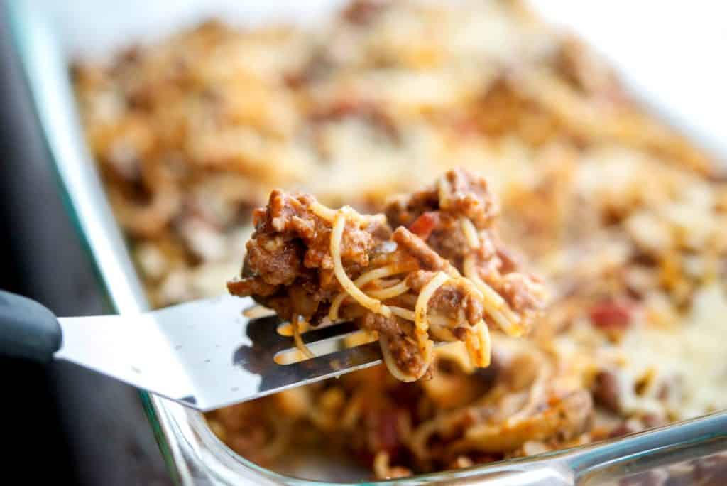Spaghetti casserole close up on a fork.