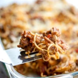 Spaghetti casserole close up on a fork.