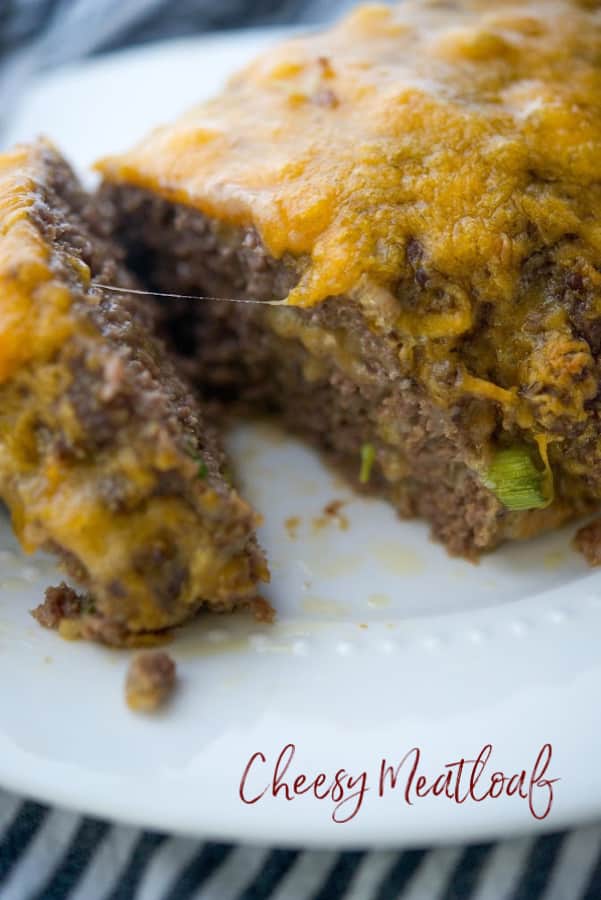 This meatloaf made with lean ground beef, shredded Cheddar cheese, and Panko breadcrumbs is super cheesy, moist and delicious! 