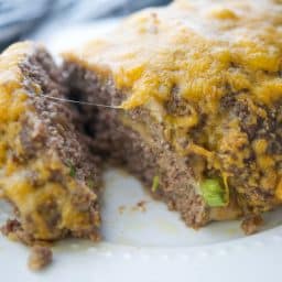 Cheesy Meatloaf on a white plate