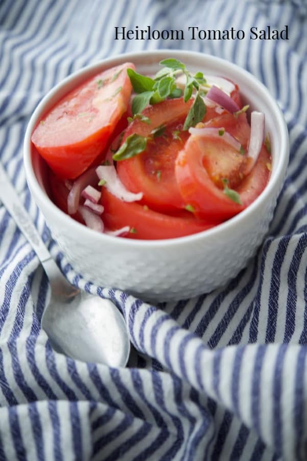 A bowl of tomatoes and onions