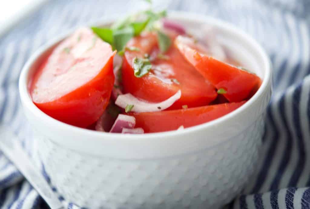 Heirloom Tomato Salad in a white bowl